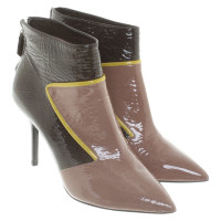 Pollini Ankle boots in nude / brown