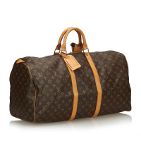 Louis Vuitton Keepall in Tela in Marrone