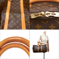 Louis Vuitton Keepall in Tela in Marrone