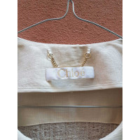 Chloé Jacke/Mantel aus Seide in Creme