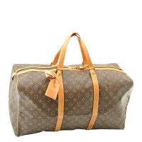 Louis Vuitton Keepall in Tela in Marrone