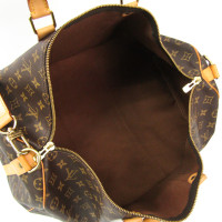 Louis Vuitton Keepall in Tela in Marrone