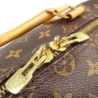 Louis Vuitton Keepall in Tela in Marrone