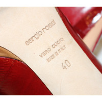 Sergio Rossi Pumps/Peeptoes aus Leder in Rot