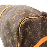 Louis Vuitton Keepall in Tela in Marrone