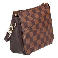 Louis Vuitton Troussee in Brown
