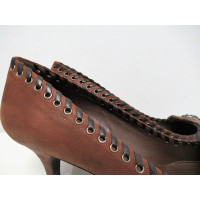 Prada Pumps/Peeptoes Leather in Brown