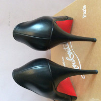 Christian Louboutin Pumps/Peeptoes aus Leder in Schwarz