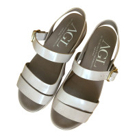 Agl Sandals Patent leather in Nude