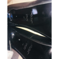 Yves Saint Laurent Pumps/Peeptoes aus Leder in Schwarz