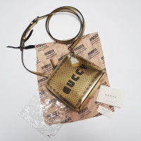 Gucci Umhängetasche aus Leder in Gold