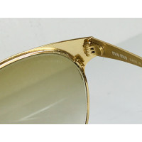 Miu Miu Sunglasses in Gold