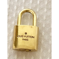 Louis Vuitton Sac à main/Portefeuille en Doré