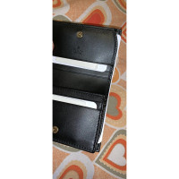 Gucci Täschchen/Portemonnaie aus Leder in Schwarz