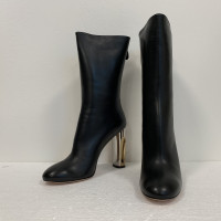 Alexander McQueen Boots Leather in Black
