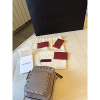 Valentino Garavani Rockstud Mini Crossbody Leather in Beige