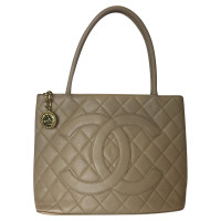 Chanel Medallion in Beige