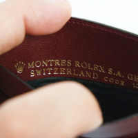 Rolex Accessoire en Cuir en Bordeaux
