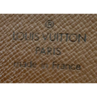Louis Vuitton Täschchen/Portemonnaie aus Leder in Braun