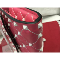 Valentino Garavani Rockstud Mini Crossbody Leather in Fuchsia