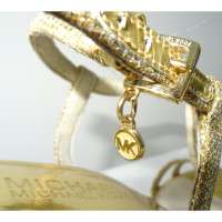 Michael Kors Sandalen aus Leder in Gold