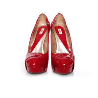Versace Pumps/Peeptoes Patent leather in Red
