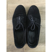 Alaïa Chaussures à lacets en Daim en Noir