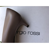 Sergio Rossi Pumps/Peeptoes aus Leder in Rosa / Pink