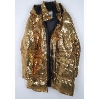 Moschino Jacke/Mantel aus Baumwolle in Gold