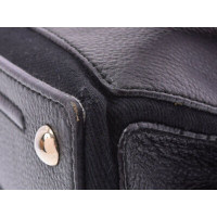 Yves Saint Laurent Handtasche aus Canvas in Schwarz