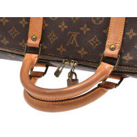 Louis Vuitton Keepall Bandouliere 60 in Tela in Marrone