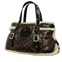 Louis Vuitton Handbag Canvas in Brown