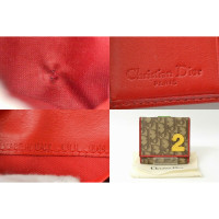Christian Dior Täschchen/Portemonnaie aus Canvas in Braun
