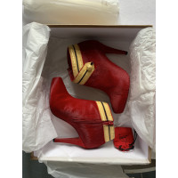 Christian Louboutin Enkellaarzen in Rood