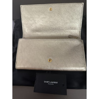 Yves Saint Laurent Bag/Purse Leather in Gold
