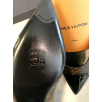 Louis Vuitton Chaussons/Ballerines en Cuir en Marron