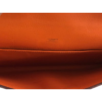 Hermès Kelly Clutch aus Leder in Orange