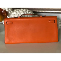 Hermès Kelly Clutch Leather in Orange