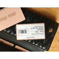 Miu Miu Sac à main/Portefeuille en Cuir verni en Noir