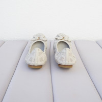 Louis Vuitton Slippers/Ballerina's Leer in Grijs