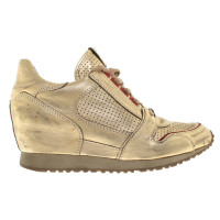 Ash Gold colored sneakers