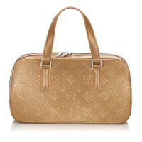 Louis Vuitton Handbag Leather in Gold