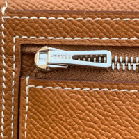 Hermès Täschchen/Portemonnaie aus Leder in Braun