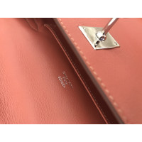 Hermès Kelly Clutch aus Leder in Rosa / Pink