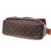 Louis Vuitton Viva Cité Canvas in Brown