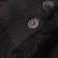 Gucci Jacke/Mantel aus Pelz in Schwarz