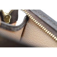 Louis Vuitton Clutch Bag Canvas in Brown