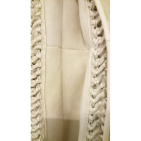 Versace Jacke/Mantel aus Pelz in Ocker