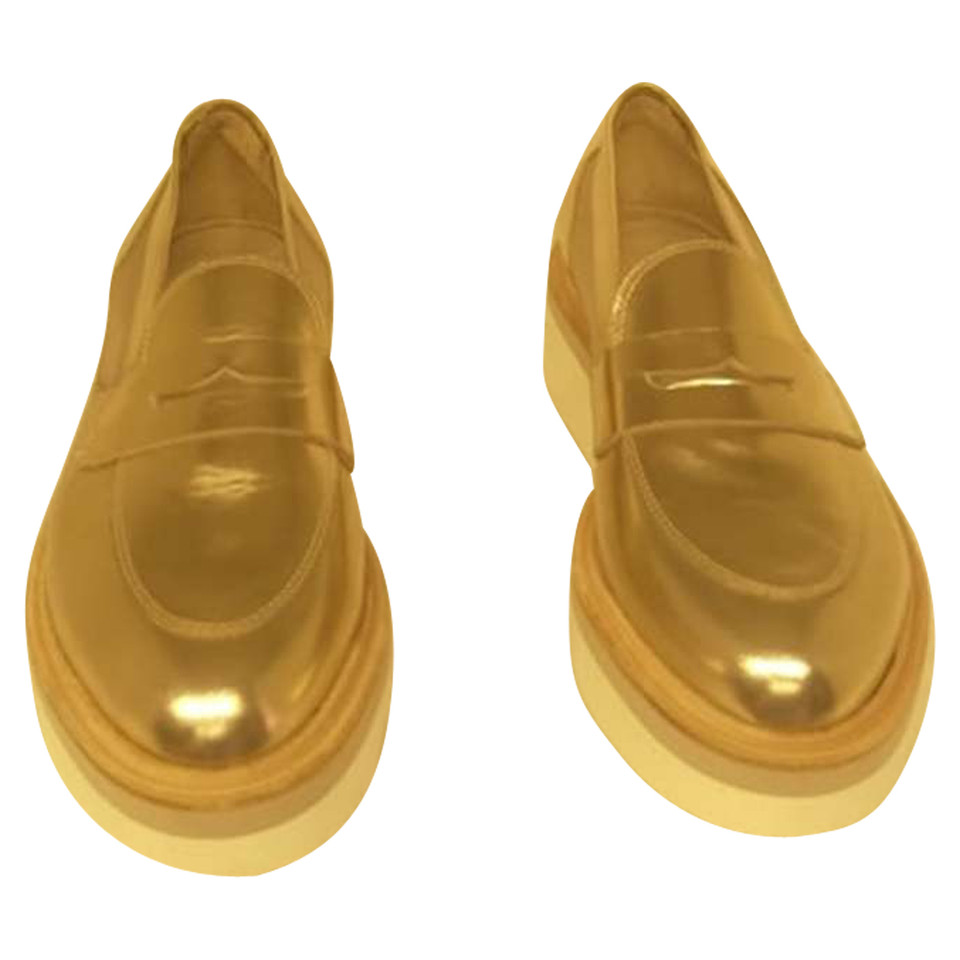 Baldinini Schnürschuhe aus Leder in Gold