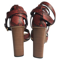Gucci Red python heel sandals.